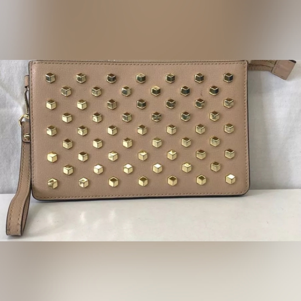 Michael Kors tan wristlet.